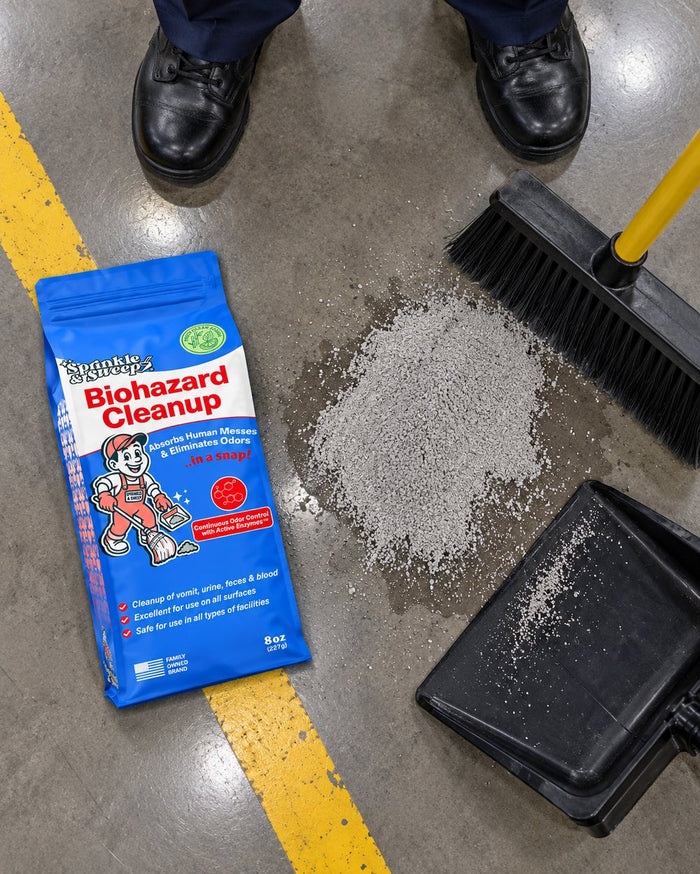 Custodian sweeping up a spill in a detention facility corridor